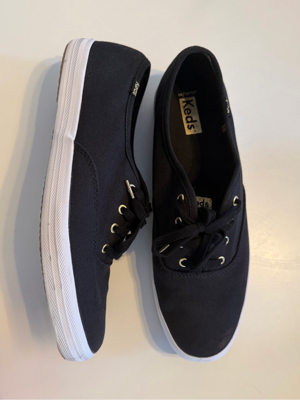 Keds Champion Canvas Sneakers in Black with White Sole and Gold Accents